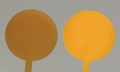 Polymeric compounds including CANdots® Series A Plus showing their processability (left: without excitation, right: with excitation