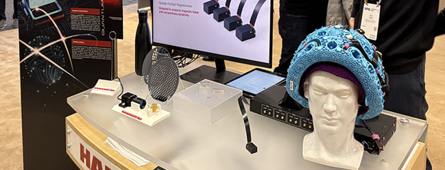 Cerca Magnetics 4 is evaluating OPM for Magnetic Encephalography (MEG). Photo from Hamamatsu Photonics booth at Photonics West 2025
