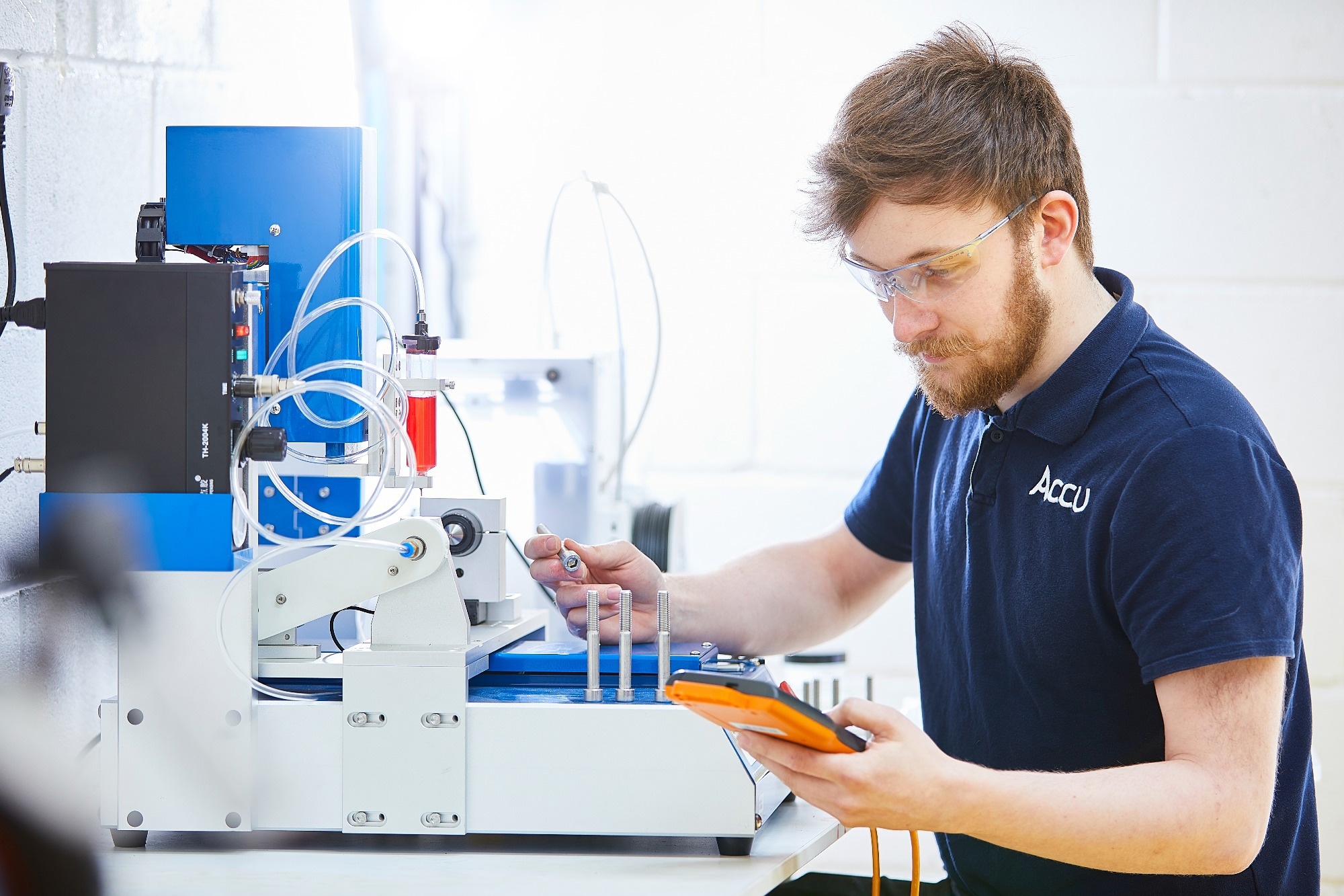 A scientist at Accu Components