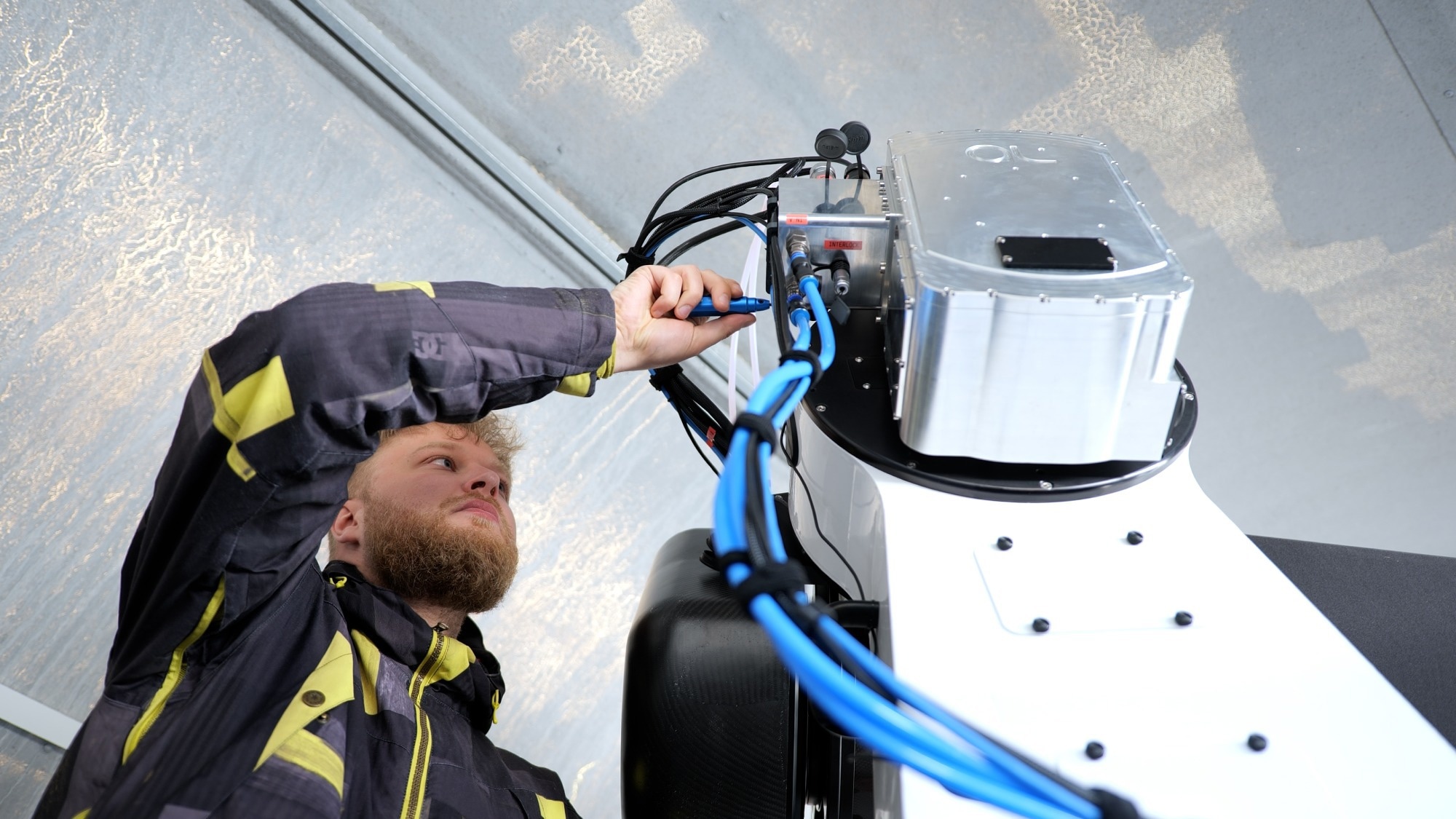 An Astrolight engineer working on a ground station