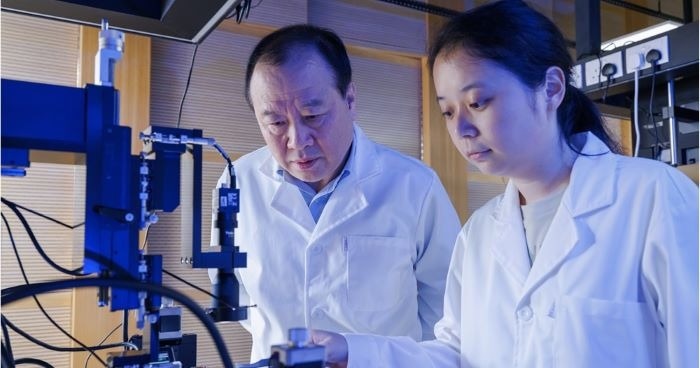 Prof. Liu Ai-Qun, a Chair Professor of Quantum Engineering and Science and Director of the Institute for Quantum Technology (IQT), a global STEM Scholar and Fellow of Singapore Academy Engineering, (left), and Dr Zhu Hui Hui (right) have successfully developed a quantum microprocessor chip for molecular spectroscopy simulation of actual large-structured and complex molecules. Image Credit: The Hong Kong Polytechnic University Prof. Liu Ai-Qun, a Chair Professor of Quantum Engineering and Science and Director of the Institute for Quantum Technology (IQT)