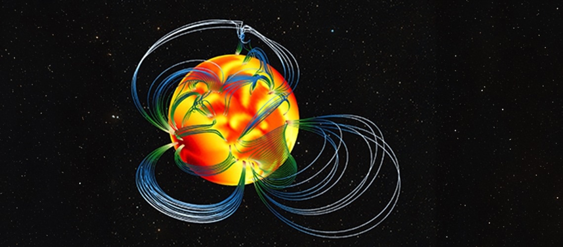 A simulated magnetar with magnetic field lines and surface temperature (temperature increases with color, tending from red to yellow)