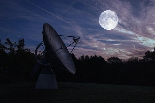 New Theory Suggests Dark Matter Could Leave Measurable Red or Blue Tint on Light