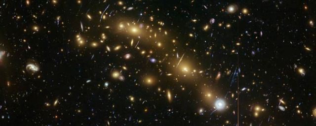 Hubble Enables Most Precise Mass Map of Distant Galaxy Cluster