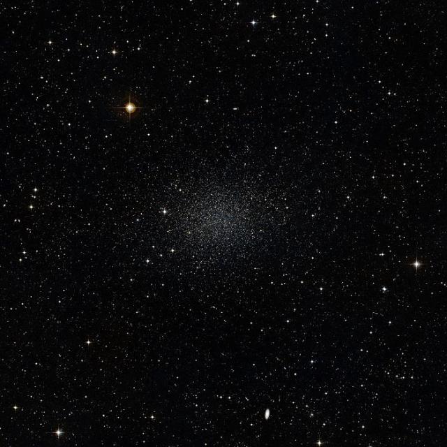 Two Stars with Unusual Chemical Content Uncovered in Sculptor Dwarf Galaxy