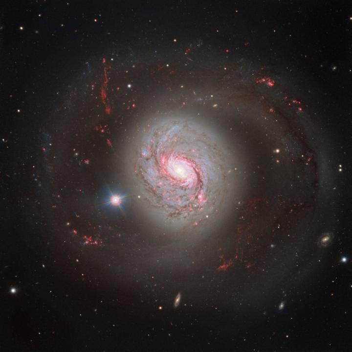 ESO's Very Large Telescope Captures Magnificent Face-on View of Barred Spiral Galaxy
