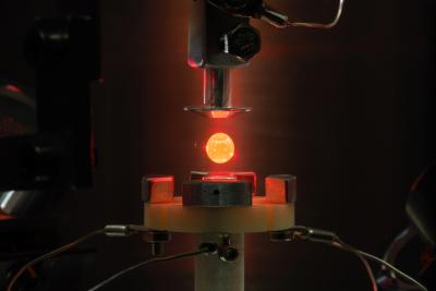 Levitated Hot Metal Droplets Supercooled Using X-rays