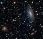 Spiral Galaxy Caught Like a Dandelion in a Breeze