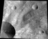 Carbon-Rich Asteroids Contribute to Dark Material on Giant Asteroid Vesta