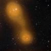 Planck Discovers Bridge of Hot Gas Connecting Galaxy Clusters