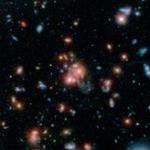 Core of Distant Massive Galaxy Cluster Bursting with New Stars