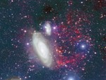 Astronomers Discover Spectacular Tail of Gas from Nearby Galaxy