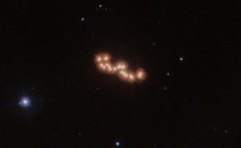 NASA's Hubble Space Telescope Captures Slow Waltz of Two Brown Dwarfs