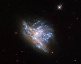 Wide Field Camera 3 on Hubble Space Telescope Captures the Image of Two Colliding Galaxies, NGC 6052