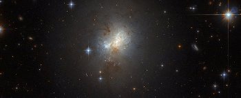 Newly Found Dwarf Starburst Galaxy Could Offer Intriguing Hints at How Galaxies Form and Evolve