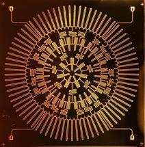 New Electronic Array on Microchip Simulates Particle Interactions in Hyperbolic Plane