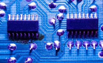 Mode Hybridization Expands Nonlinear Bandwidth on Photonic Chips