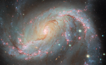 A Cosmic Masterpiece: The Barred Spiral Galaxy NGC 1672