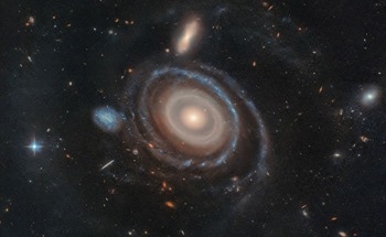 Hubble Finds Record Nine Rings in Distant Galaxy