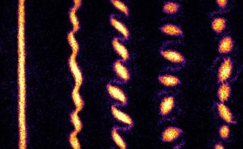 Physicists Watch as Ultracold Atoms Form a Crystal of Quantum Tornadoes