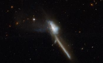 Merging of Galaxies Cause AGN-Heated Dust to Dominate Cool, Far-Infrared Emission in the Galaxy