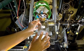 Unpaired Electrons Initiating Chemistry at “Distant” Locations