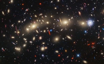 Scientists Find 14 New Transient Objects in Space by Peering Through a Galaxy “Magnifying Glass”